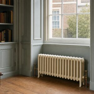 Victorian four-column cast iron radiator, 485mm high, factory painted, in a period room.